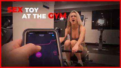 Sexy Girl Working out with Remote Control Sex Toy in Public Gym watch  online or download