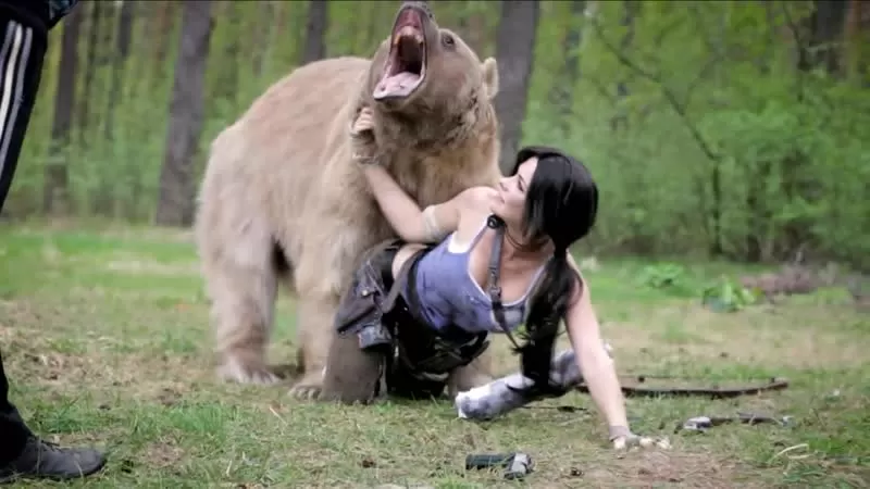 Animal Bear And Girl Sex Xxx - BEAUTIFUL GIRL POSES WITH A BEAR FOR LARA CROFT COSPLAY watch online or  download